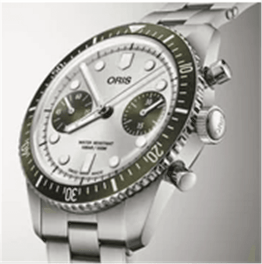 01 771 7791 4051-07 8 20 18 Oris Divers Sixty-Five 40mm Ocean-Green Detailing And A Silver Sunray Dial. Oris Calibre 771, Automatic Chronograph With A 62-Hour Power Reserve. Stainless Steel Case And Bracelet